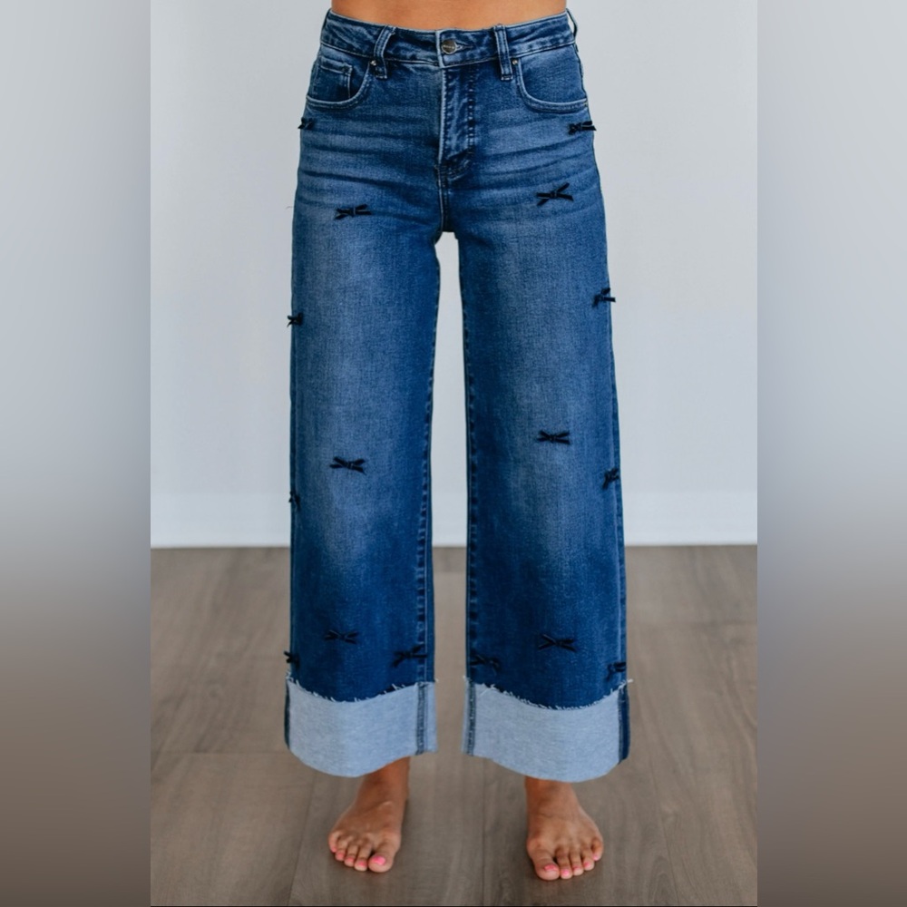 Risen Wide Leg Jeans with Bows.
